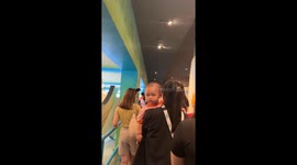 Disneyland Visitor Makes Funny Faces at a Baby
