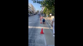 Tinos, Greece: Christians crawling up a carpeted hill in 40 degrees heat to reach church