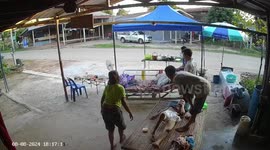 Motorcycle rider crashes into food stall selling steam buns