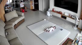 Father uses fishing rod to play with daughter from a distance