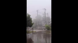 Electric car escapes on its own during rainstorm in China