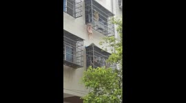Everyday hero: Man saves girl stuck in window security bars