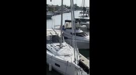 Man pulled by legs to dock boat in Newport Beach, California
