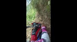 Couple take scary ride along narrow mountain path
