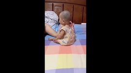 Baby startled to tears by father's loud snore in China