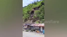 Landslide wipes out roadside houses in the Philippines