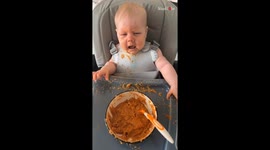 Hilarious video of baby’s uproarious response to mealtime excitement