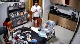 Chinese man startled by cockroach during extermination attempt