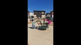 Spinning Kid Picks Treat Off the Ground