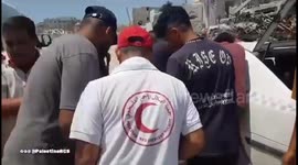 Palestine: Palestine Red Crescent Society teams transported a martyr to the Indonesian Hospital after a drone strike near the entrance of Mahdia Al-Shawa School