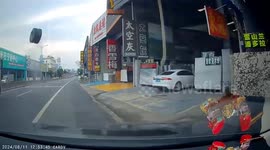 Terrifying moment truck tyre flies off and smashes into parked car in southern China