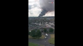 Intimidating view of massive smoke plume rising from fire-damaged area in Clonshaugh, Dublin