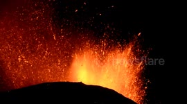 Lava spewing from Mount Etna illuminates night sky
