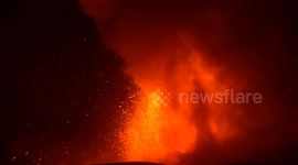 Huge fountains of lava spew into night sky as Mount Etna erupts