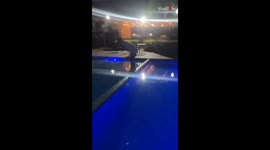 Pool night turns hilarious when hesitant friend takes a funny tumble