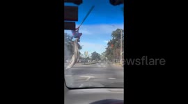 'Spider-Man' seen swinging on traffic lights above cars in Buenos Aires