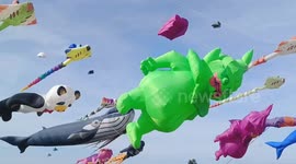 Pandas, snakes, and dragons seen in sky during International Kite Festival