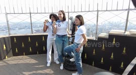 USA: Olympians Lee Kiefer, Lauren Scruggs and Jacqueline Dubrovich of USA Fencing Team visit the Empire State Building