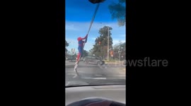 Argentina: A Spiderman at a traffic light in Buenos Aires