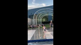 Child enjoys fountain play at SM Mall of Asia, Philippines
