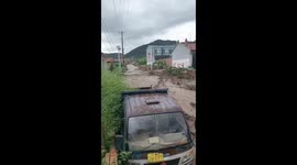 Flash floods hit Lvliang village, Shanxi Province, after heavy rain