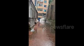 China: Waterfall Just Formed in Urban Area