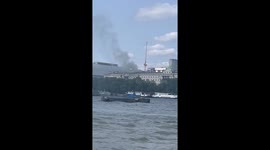 Around 100 firefighters are tackling a blaze at Somerset House in central London.