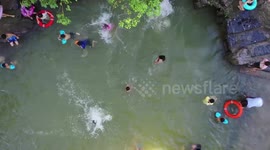 Villagers transform water well into small swimming pool in China's Hunan