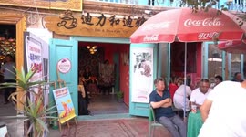 Chinese-Tanzanian couple running coffee shop in China's Kashgar