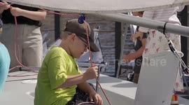 Russia's remote-controlled model sailboat race draws sailing enthusiasts