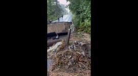 Large section of road collapses due to flash flooding in Connecticut
