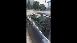 Good Samaritans rescue senior from car stuck on flooded road in Mississauga, Canada