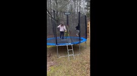 New trampoline surprise ends in comical fail as boy falls through bumper pad