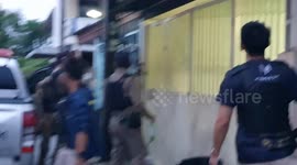Police raid house 'used as illegal online gambling office' in Thailand