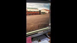 Trailer Blown By Wind Misses Mowers