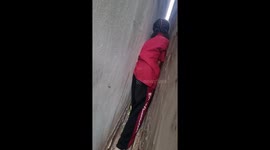 Schoolgirl rescues cat stuck in gap between buildings