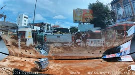 Thief casually steals durian from pickup truck