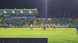 Defender punches opposition goalkeeper going up for corner
