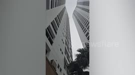 Window cleaner falls from 31st floor of hotel when scaffolding collapses