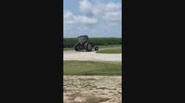 John Deere Tractor Drives on Flat Tire