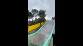 Girl's nostalgic slide ride ends with an unexpected collision with a pole