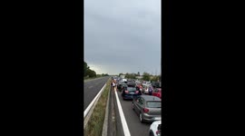 Italians Play Cards And Make Friends In Traffic Jam