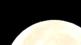 RARE OCCULTATION OF PLANET SATURN BY THE NEAR-FULL MOON SEEN IN SWITZERLAND AT DAYBRAKE