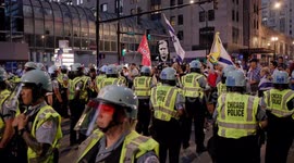 Skirmishes with police as pro-Palestine activists protest outside Israeli consulate in Chicago