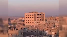Palestine: Israeli aircraft targeted Zaqout Tower in Al-Nuseirat camp in the central Gaza Strip