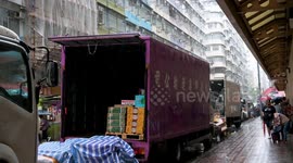 China: Hong Kong Summer Rainstorm: Resilient Kowloon Streets in August Downpour