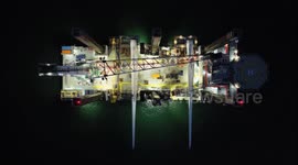 Spectacular Drone Footage of Off Shore Supply Ship & Wind Turbine Carrier Lit UP At Night