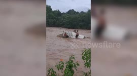 India: SDRF rescues stranded vehicle from stream in northern India