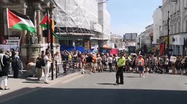 UK: Great support from Brighton Dykes, as they pause their Pride march while passing stall at The Clocktower in Brighton city center