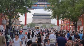 China: Crowds of tourists tour Qianmen Street in Beijing